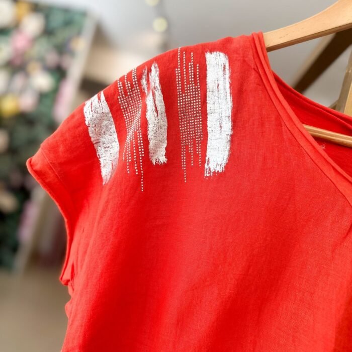 REMERA PIEL LIBRE PINCELADAS ROJA