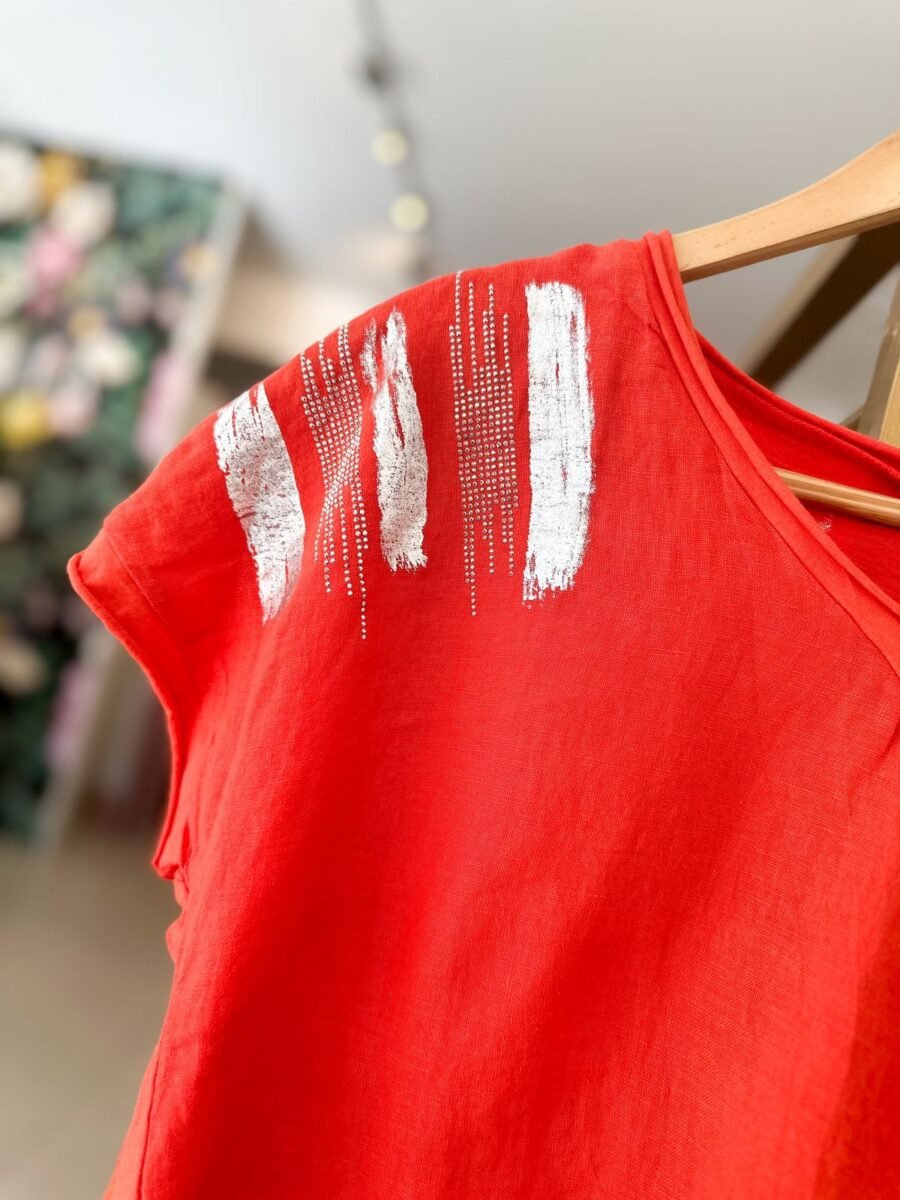 REMERA PIEL LIBRE PINCELADAS ROJA